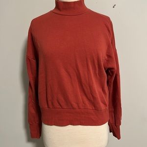 Orange Turtleneck Sweater